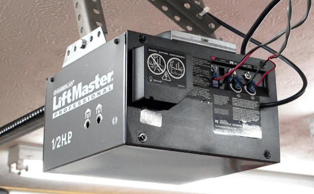 A garage door opener mechanism